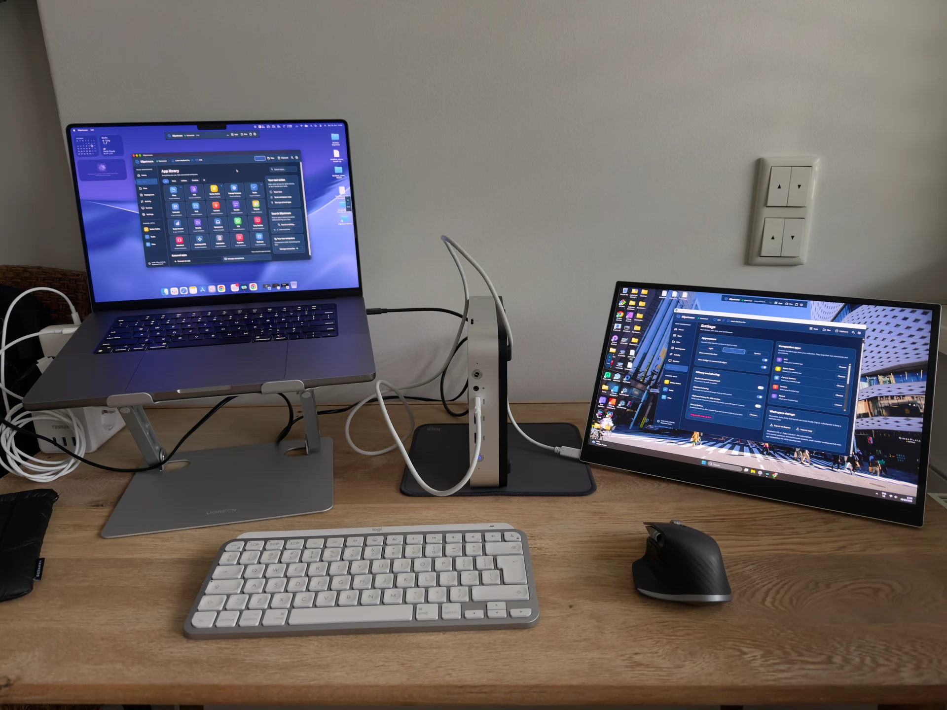 Real Slipstream desk with a MacBook, Windows display, keyboard and mouse